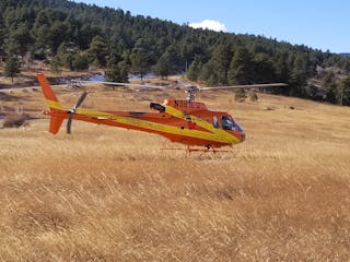 Flight for Life Colorado on an incident standby. Large fields like this work well for landing zones but can be complicated with more trees or site work.