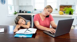 Mother Working From Home With Kid